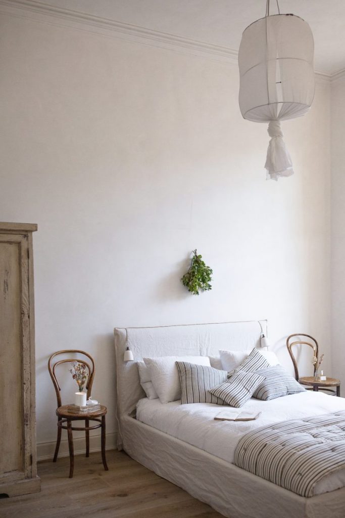 rustic modern bedroom
white bedroom neutral slipcover bed board