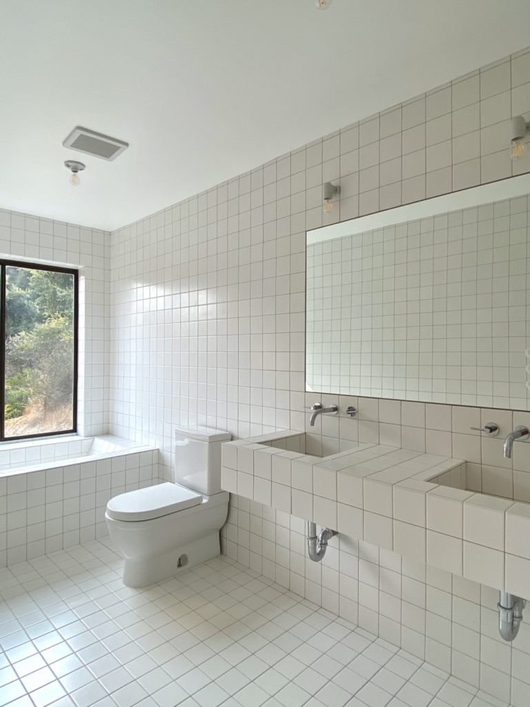 all tile bathroom white